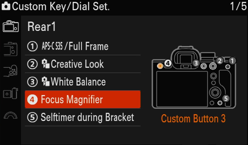 Screenshot of camera custom key/dial settings menu showing Focus Magnifier option highlighted as Custom Button 3.