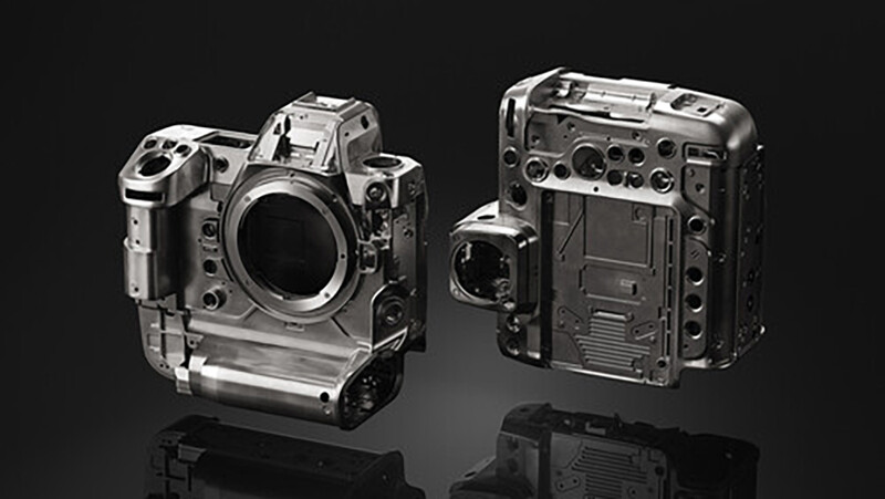 Side-by-side comparison of two professional camera bodies shown in detailed product photography against a dark background.