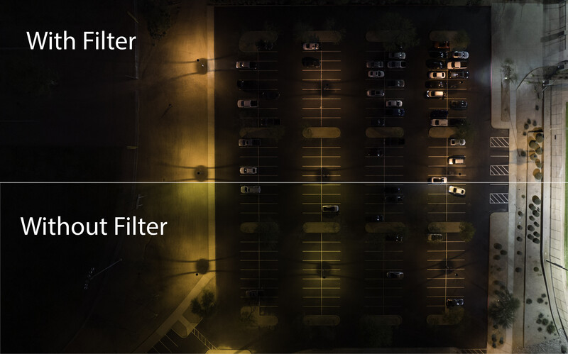 Aerial photograph comparing light pollution reduction with and without a filter over an urban area at night.