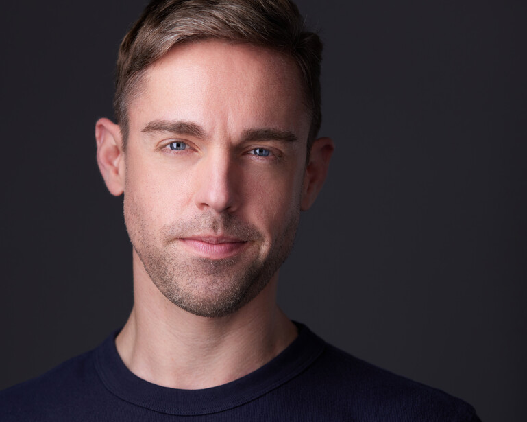 A headshot of Broadway actor Nic