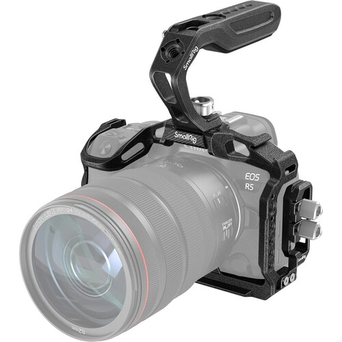 Cinema camera rig with articulating top handle mounted on DSLR body with attached lens.