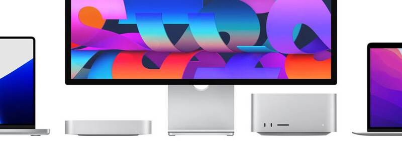 Apple display and Mac devices arranged in a product lineup featuring colorful abstract wallpaper.