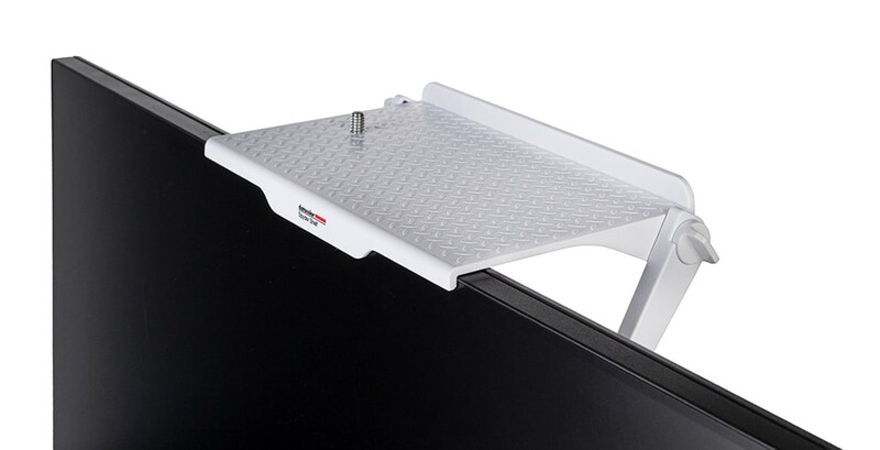 White and gray monitor light mounted on top of a black display.
