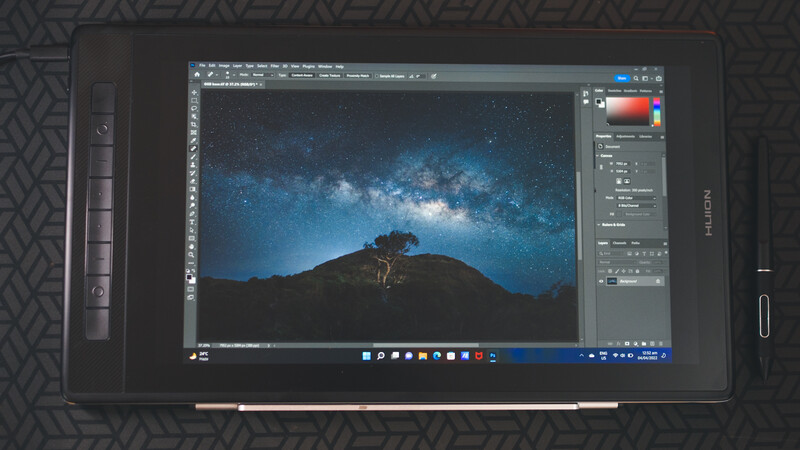 Screenshot of Adobe Photoshop displaying a nighttime landscape with silhouetted mountain and Milky Way.