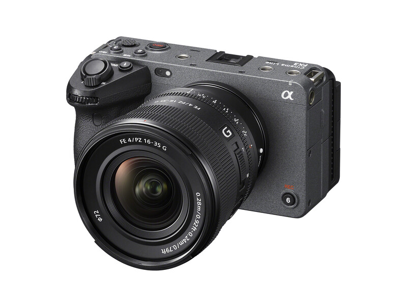 Sony Alpha mirrorless camera with attached wide-angle zoom lens on white background.