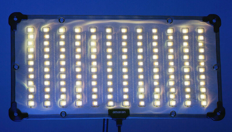 Aputure MC 4-light LED panel with 12 vertical columns of bright warm-white LEDs arranged in a grid pattern.