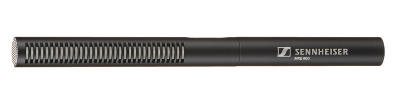 Sennheiser MKE 600 shotgun microphone with slotted grille and black body against white background.