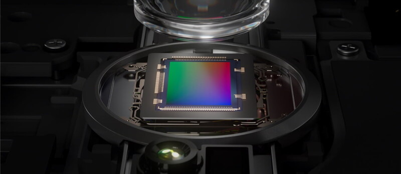 Camera image sensor with RGB color filter array displayed under a lens element.