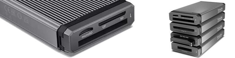 External card reader with SD, microSD, and CF card slots alongside a stack of portable hard drive enclosures.