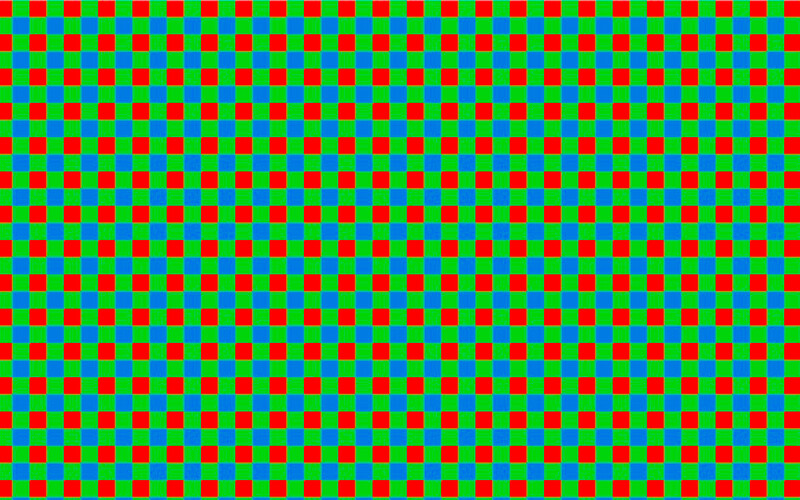 Repeating pattern of red, green, and cyan squares arranged in a regular grid on a solid background.