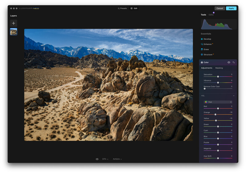 Screenshot of photo editing software with desert landscape featuring rocky outcrops and mountains.