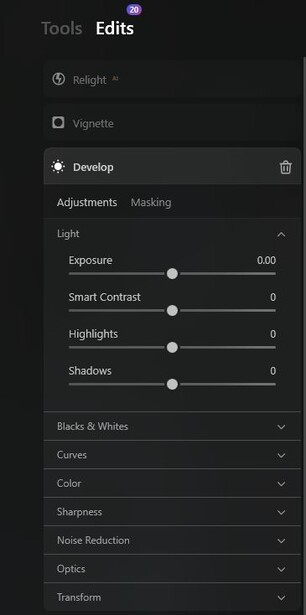 Screenshot of photo editing software's Develop panel showing adjustment sliders for exposure, contrast, highlights, shadows, and blacks & whites.