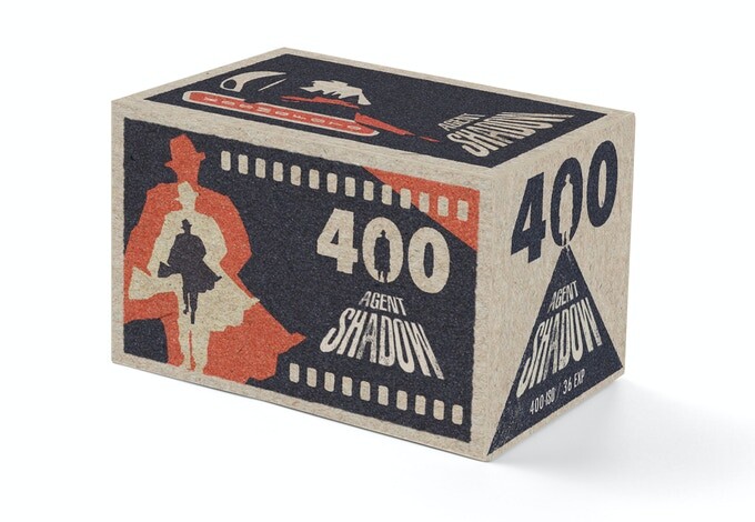 Vintage film box for 400 ASA black and white film stock with art deco graphics and silhouette figure.