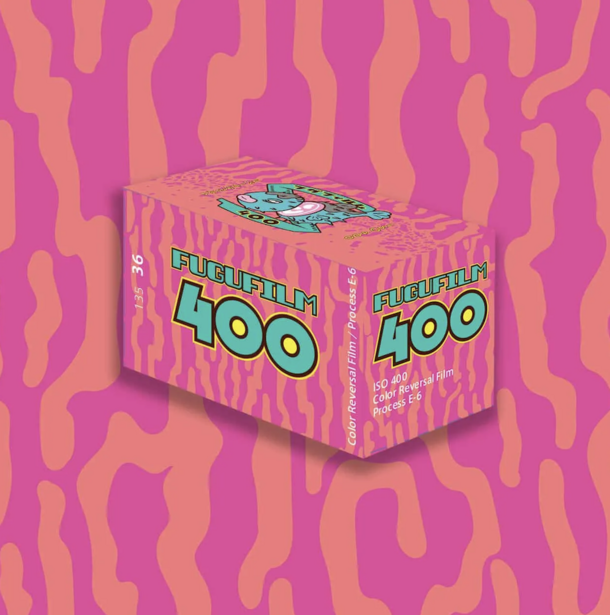 Isometric illustration of a pink cardboard box with turquoise text against a vibrant wavy pattern background.