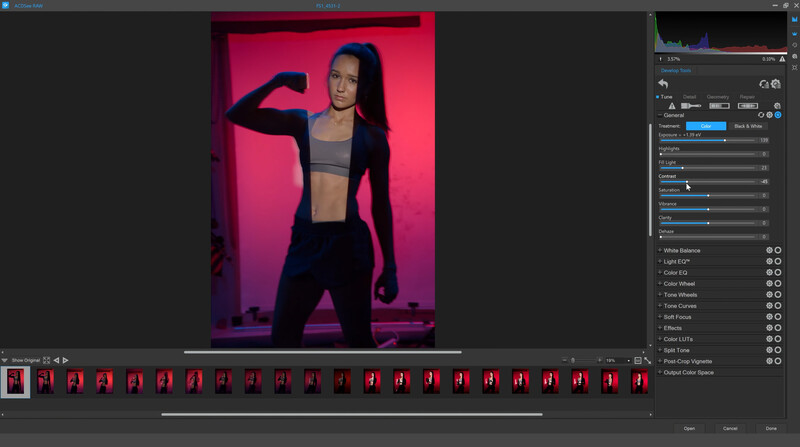 Screenshot of photo editing software showing portrait of woman against pink and purple gradient background.