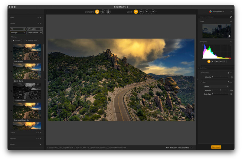 Screenshot of photo editing software displaying a mountain road landscape with histogram and adjustment panels.