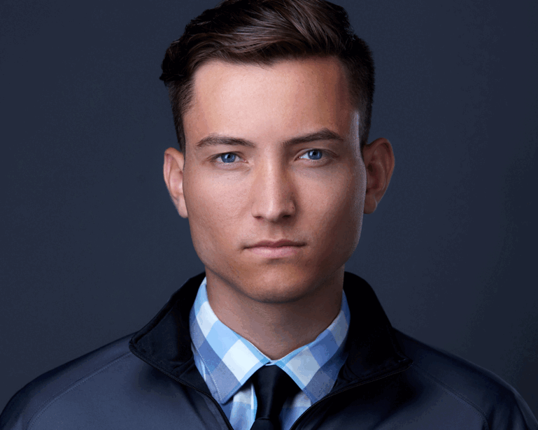 A headshot of Peter