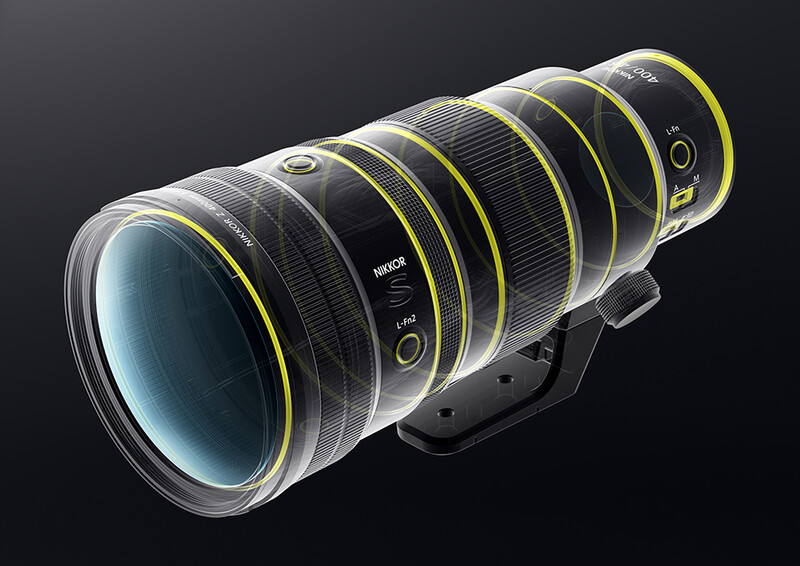 Cutaway illustration of a professional telephoto lens showing internal optical elements and mechanical components.
