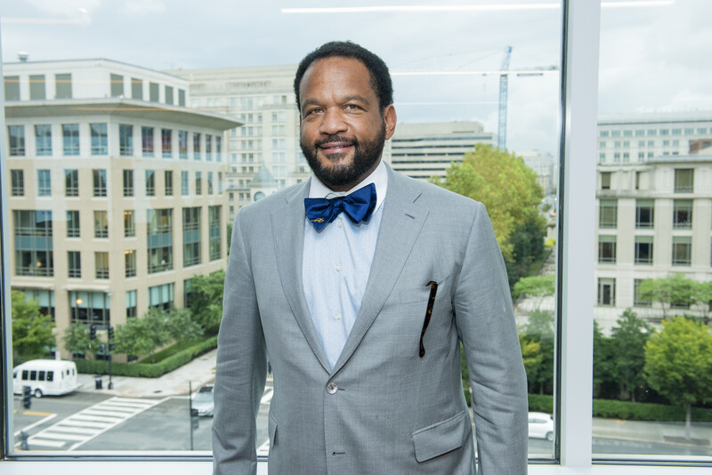 Corporate headshot photographed by John Ricard