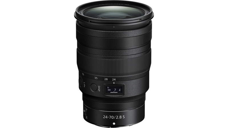 Nikon Z 24-70mm f/2.8 S telephoto zoom lens with focus ring and aperture markings visible.
