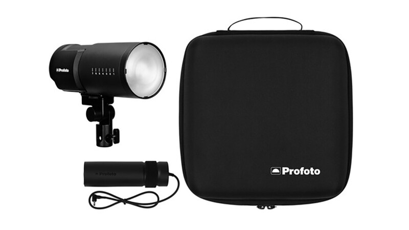 Profoto B10 Plus flash kit with carrying case, showing monolight, battery pack, and protective bag.