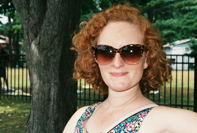 Canon EOS A2E, 50mm 1.4 lens, using the built in flash for fill.