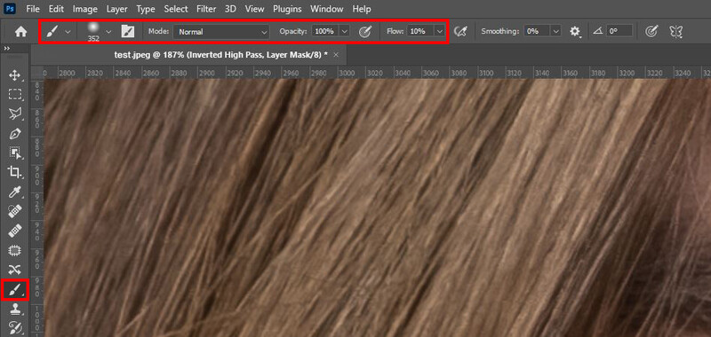 Screenshot of Adobe Photoshop showing a close-up texture of diagonal woven fabric fibers in brown and tan tones.