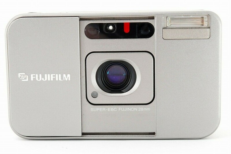 Fujifilm compact film camera with white body, pop-up flash, and rounded design from the 1990s.