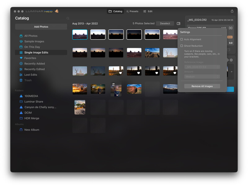 Screenshot of a photo management application displaying a grid of thumbnail images organized by date range.