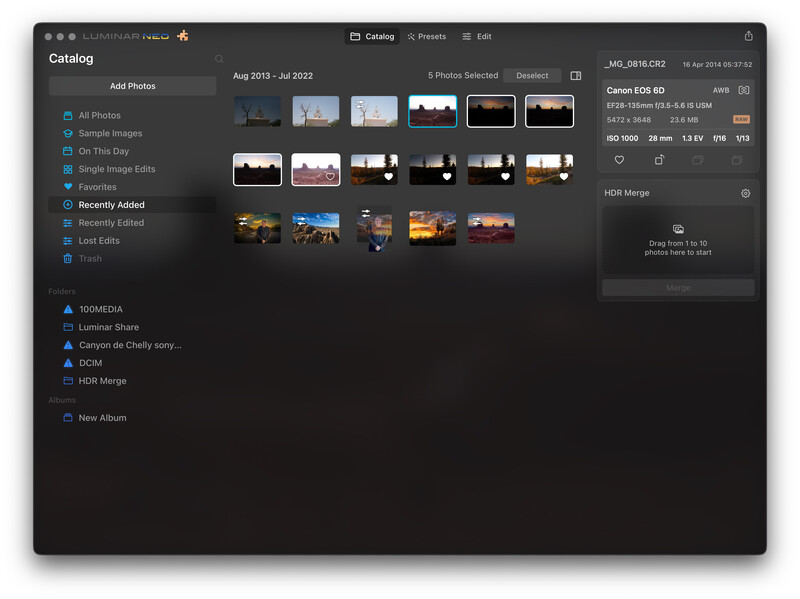 Screenshot of a photo management application showing a grid of thumbnail images organized in a catalog interface.