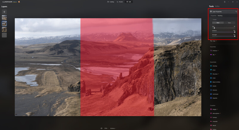 Screenshot of photo editing software showing a landscape image with a red selection overlay applied to the center portion.