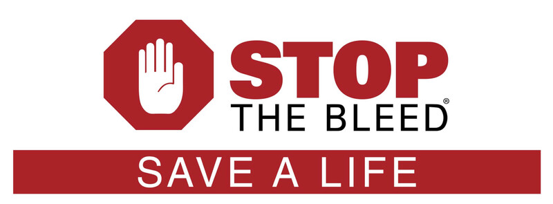 Logo for Stop the Bleed campaign featuring a white hand in a red octagon with tagline "Save a Life."