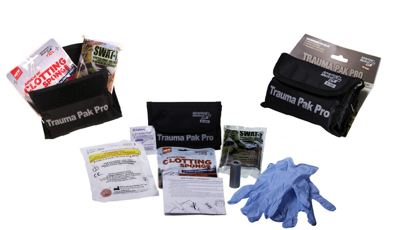 Trauma Pak Pro first aid kits displayed with contents including gauze, gloves, and medical supplies.