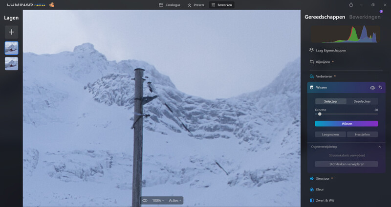 Screenshot of photo editing software showing a snowy mountain landscape with editing panels open.