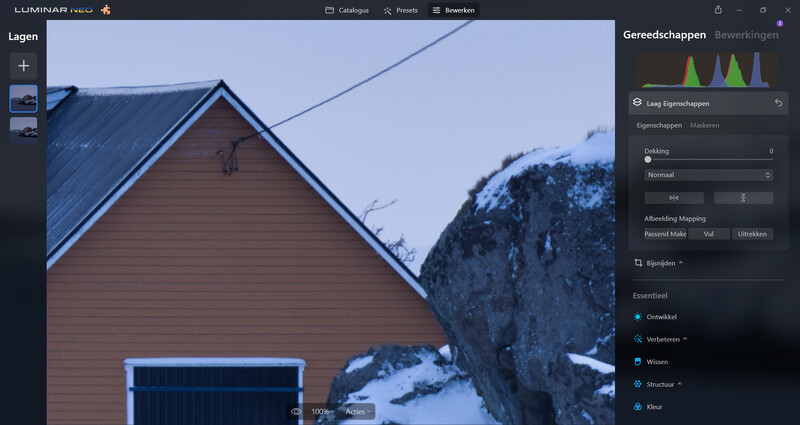 Screenshot of Luminar Neo photo editing software with a winter cabin and snowy mountain landscape in the editing canvas.