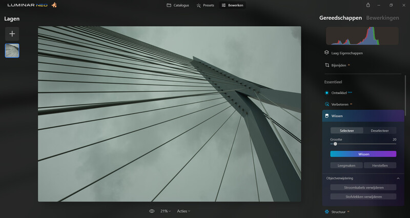 Screenshot of Luminar Neo photo editing software showing perspective lines converging on a modern bridge structure.
