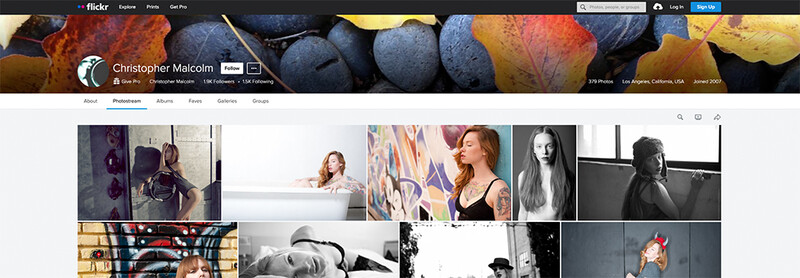 Screenshot of photographer Christopher Malcolm's Flickr profile showing a grid of portrait and artistic photographs.