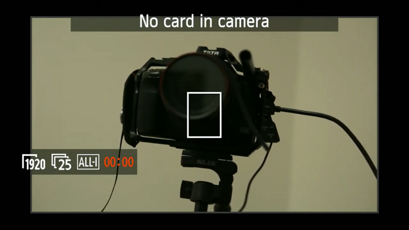 Screenshot of a camera viewfinder displaying 'No card in camera' error message with recording controls visible.