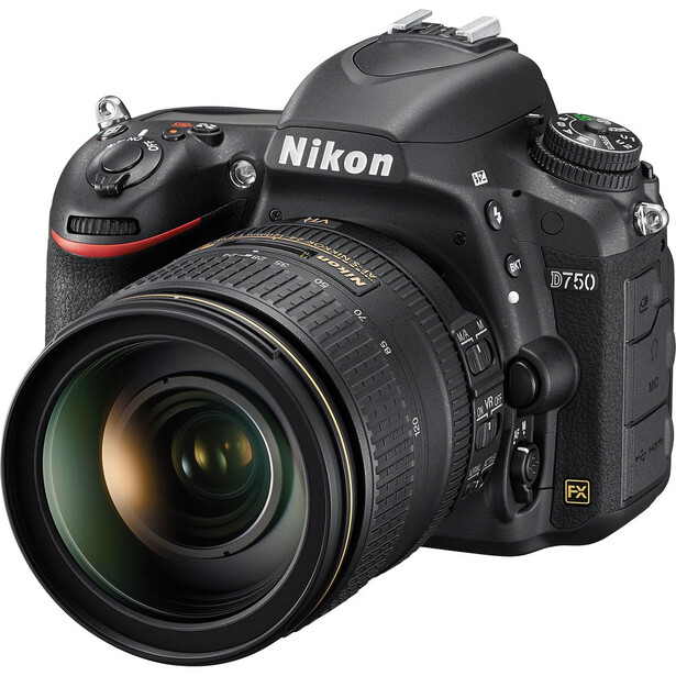 Nikon D750 DSLR camera with attached 24-70mm f/2.8 zoom lens against white background.