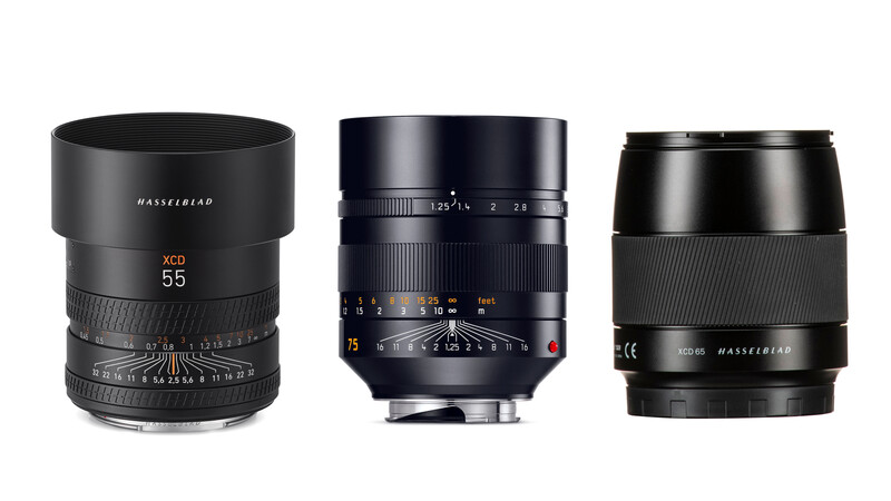 Three Hasselblad camera lenses arranged side by side against a white background.