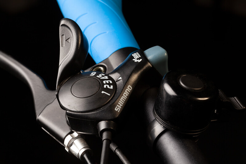 Photograph of a bicycle's gear shifter where dust has not been removed