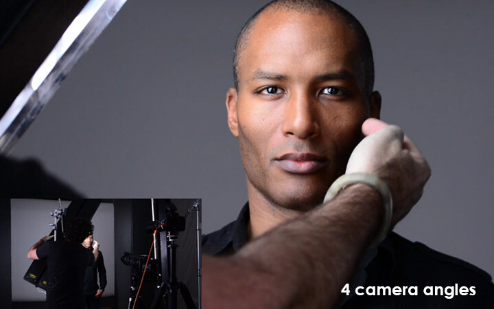 Professional portrait demonstrating multiple camera angles with studio lighting setup visible in background.