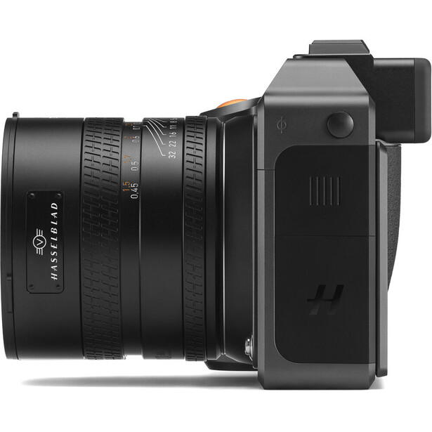 Mirrorless camera with standard zoom lens attached, shown in side profile against white background.