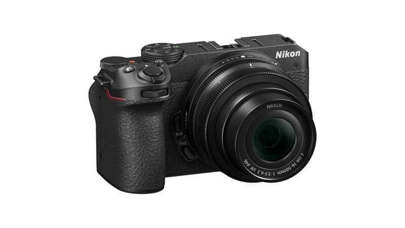 Nikon Z30 mirrorless camera with attached zoom lens, shown from a three-quarter angle against white background.