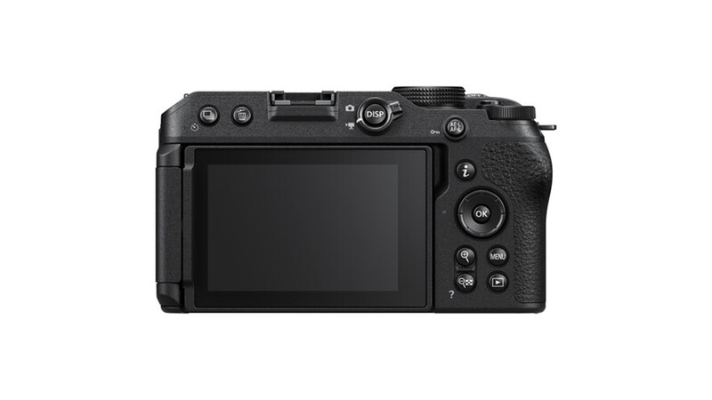 Mirrorless camera with articulating LCD screen shown from rear three-quarter view.