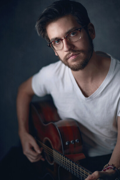 A portrait of guitarist Jesse