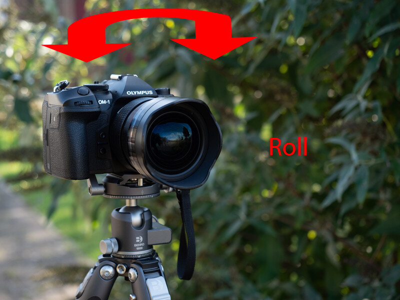 Olympus OM-1 camera mounted on tripod with red arrows indicating roll axis movement.