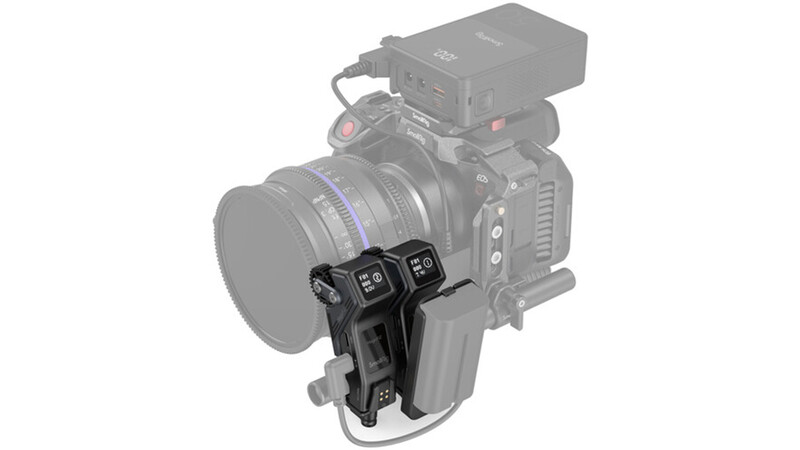 Illustration of a cinema camera with an external recorder mounted on top and a follow focus system attached to the lens barrel.