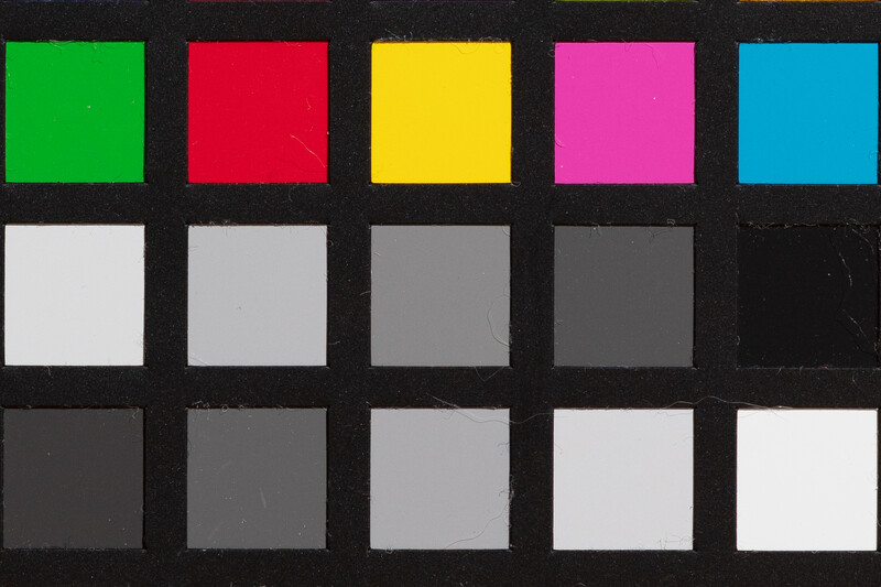Color reference chart with saturated hues in top row and grayscale tones in bottom rows.