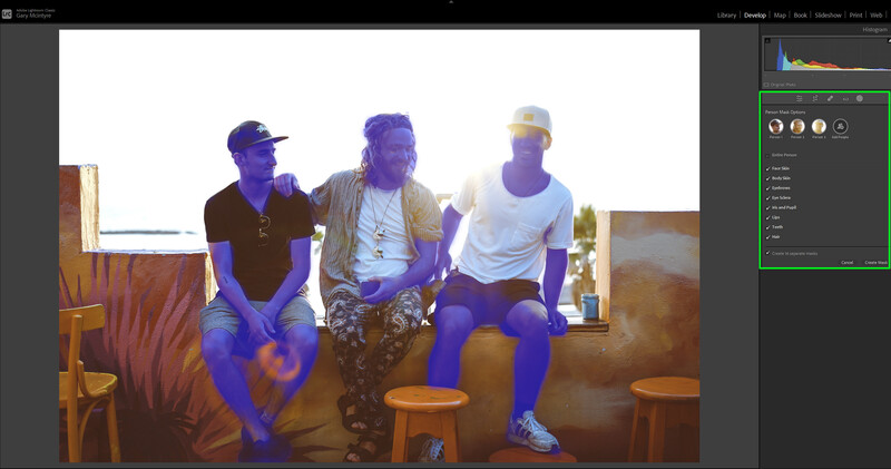 Three men sitting on wooden stools in an indoor space with warm orange and blue color grading applied.